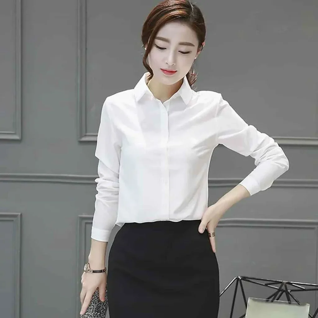 Vì sao áo sơ mi trắng công sở nữ là "item ruột" của mọi cô nàng?
